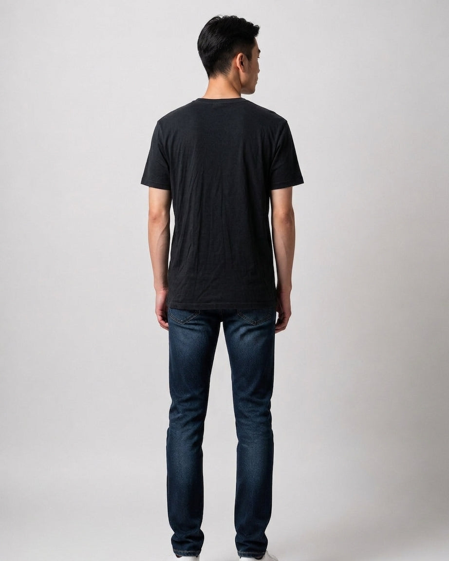 Man wearing a plain black Abercrombie & Fitch Lunar New Year t-shirt seen from behind