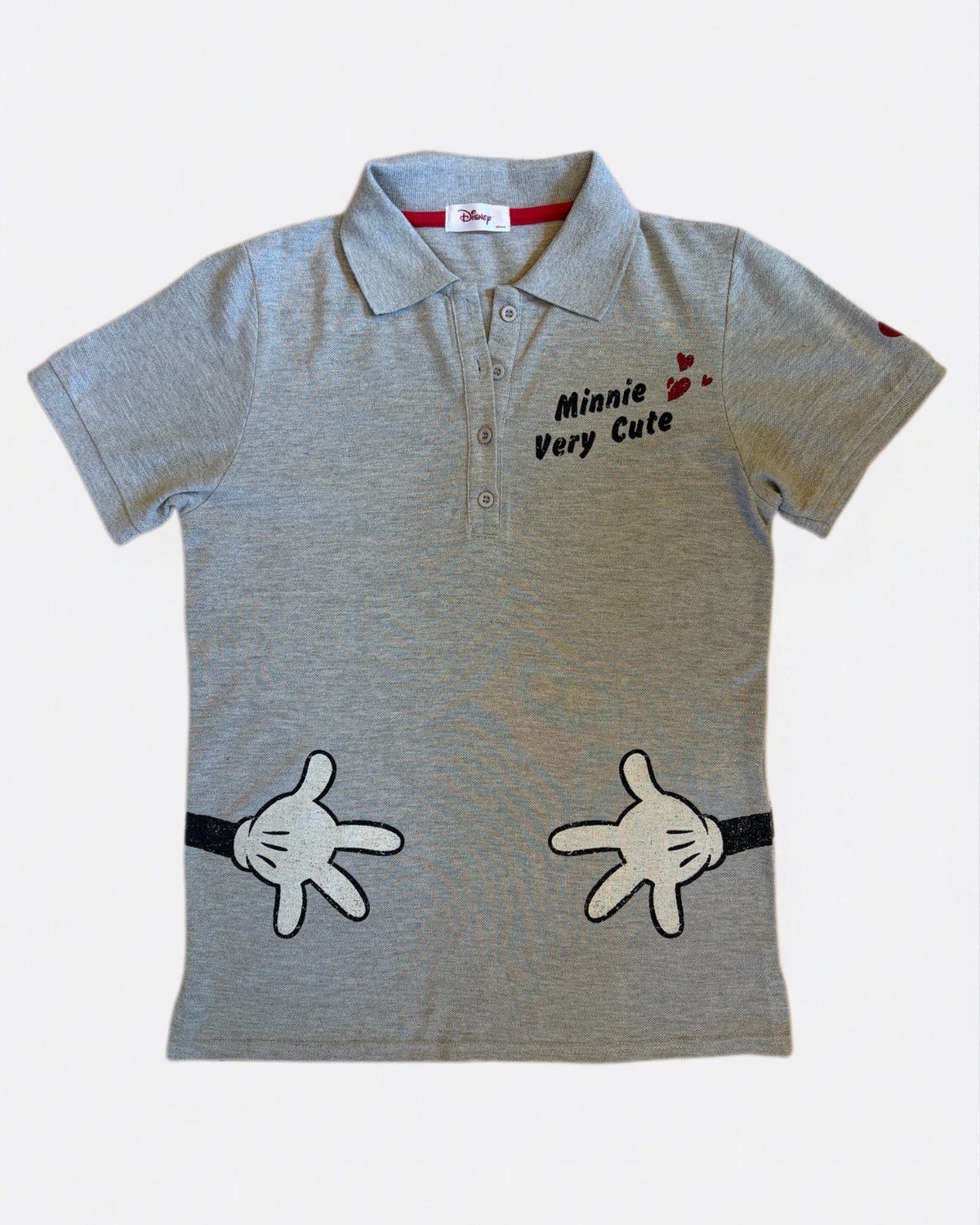 Heather grey Disney short-sleeve polo shirt with Minnie Very Cute chest text and waist hand graphics laid flat, front view