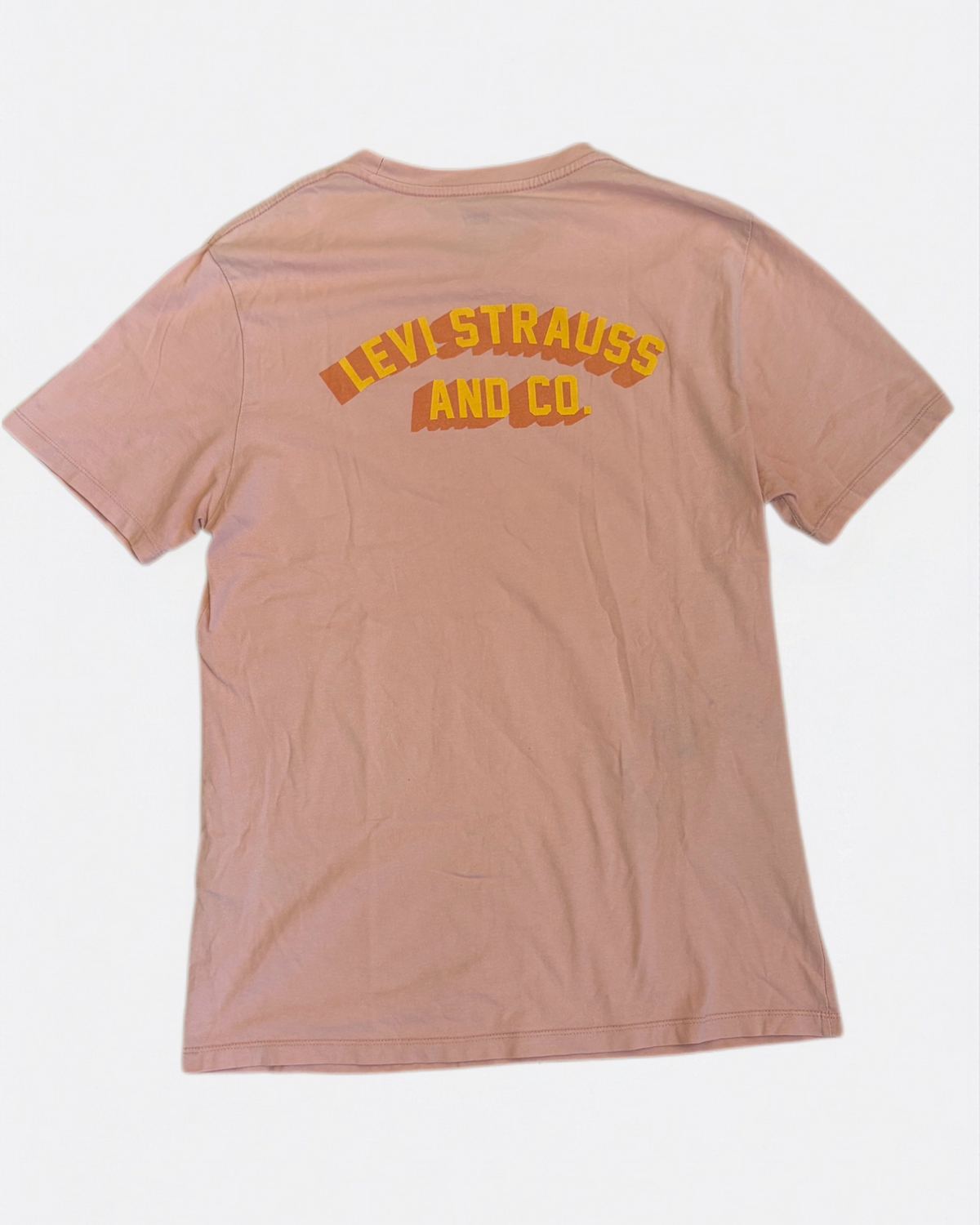Dusty pink Levi Strauss and Co. t-shirt featuring yellow curved graphic logo printed on the back, back view
