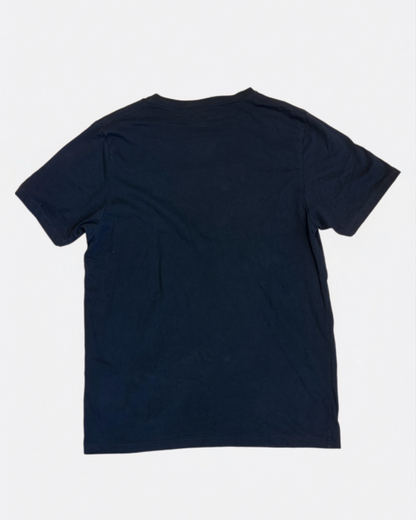 Plain navy blue crewneck cotton t-shirt laid flat, back view