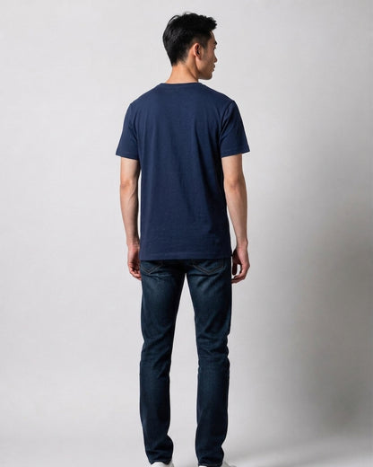Man wearing a plain navy blue Rugby World Cup 2019 t-shirt seen from behind, styled